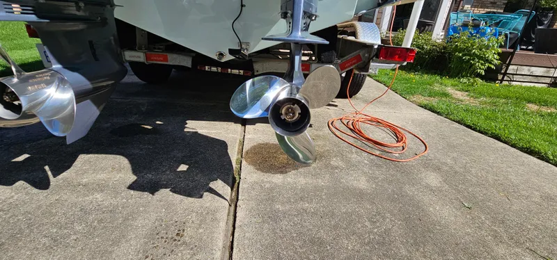 Slide: The Image of 2017 Cobia 277 Center Console boat propeller on a driveway. - 11