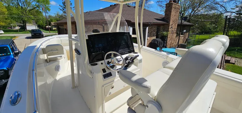 Slide: The Image of 2017 Cobia 277 Center Console boat with modern helm and seating. - 20