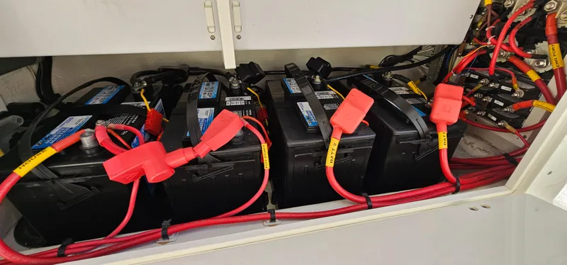 Slide: The Image of Batteries and wiring in a 2017 Cobia 277 Center Console boat. - 32