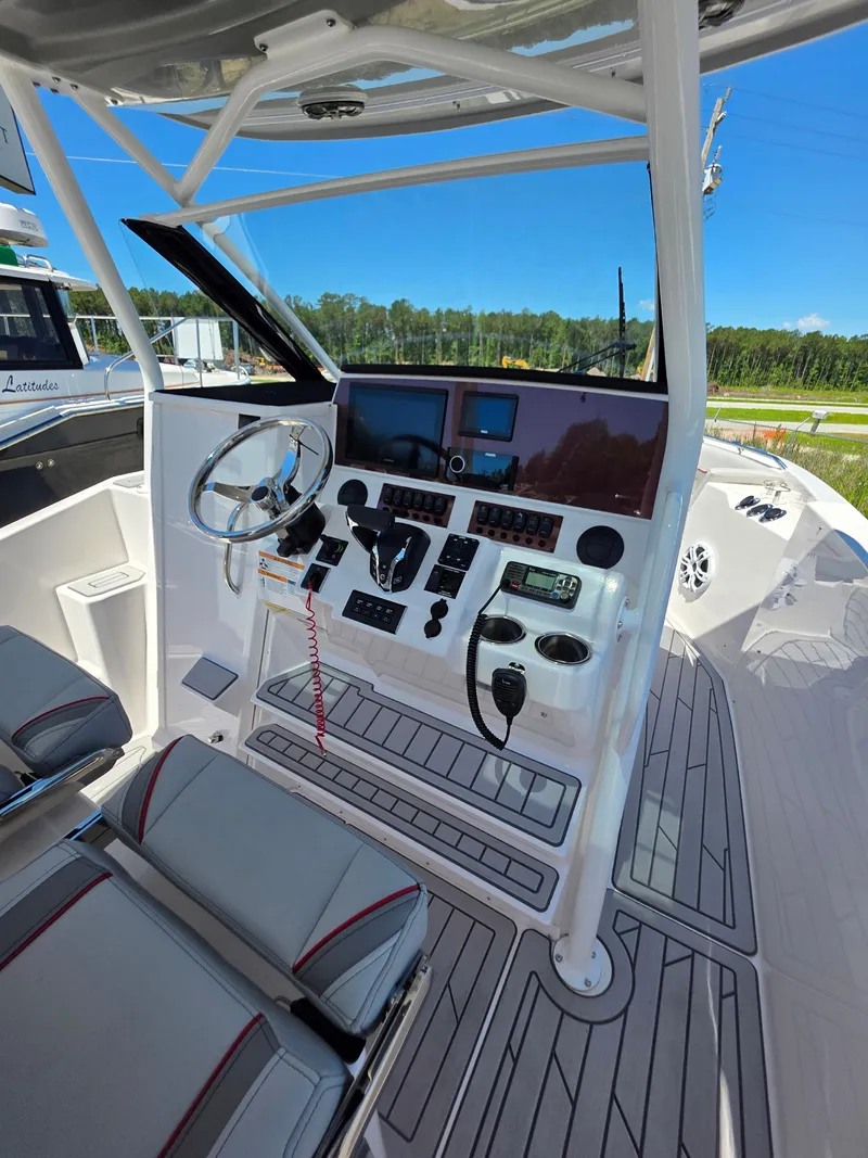 Slide: The Image of 2025 Solara S-250 CW boat cockpit with modern controls and seating. - 3