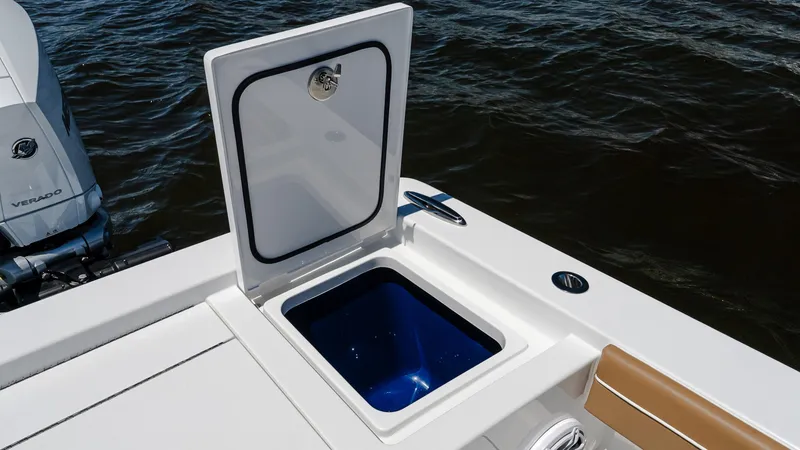 Slide: The Image of 2025 Valhalla Boatworks V-29 Hybrid with open storage compartment on deck. - 11