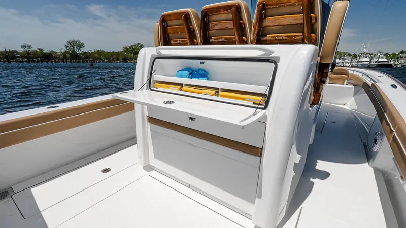 Slide: The Image of 2025 Valhalla Boatworks V-29 Hybrid with sleek deck and storage compartment. - 15