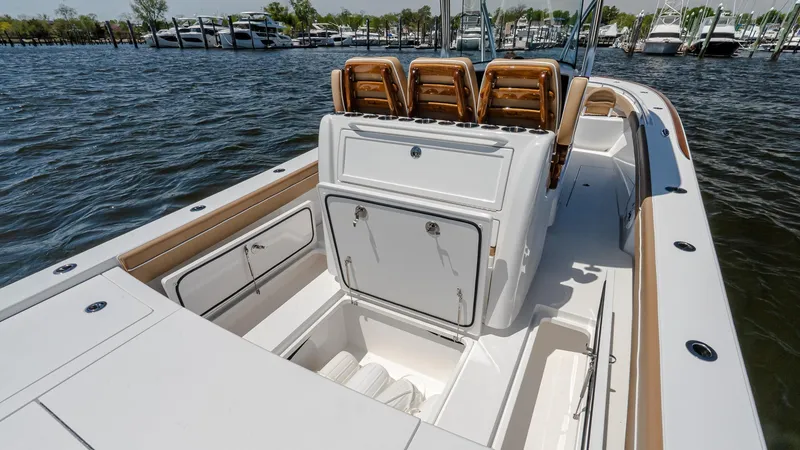 Slide: The Image of 2025 Valhalla Boatworks V-29 Hybrid, sleek design, spacious deck, luxury seating, docked on water. - 17