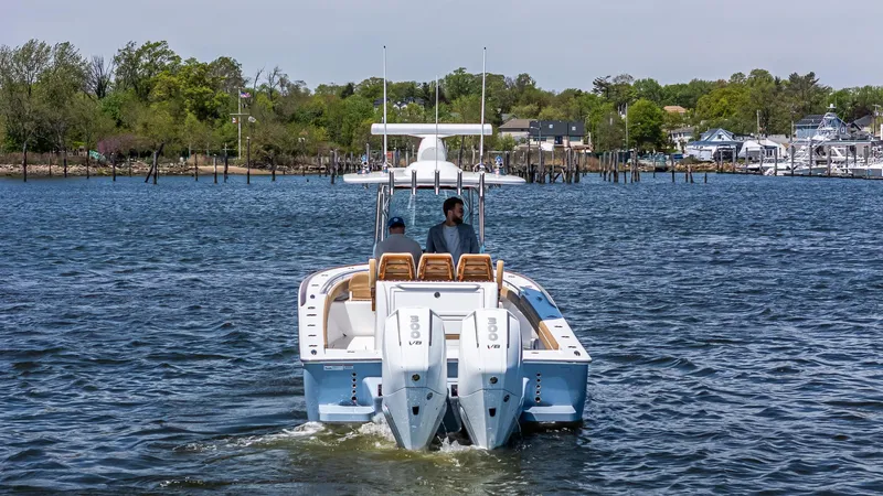 Slide: The Image of 2025 Valhalla Boatworks V-29 Hybrid cruising on a scenic waterway. - 5