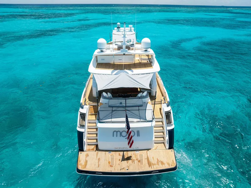 Slide: The Image of Luxury 2009 Princess Motor Yacht on clear turquoise waters. - 19