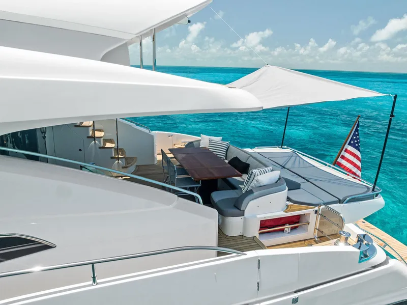Slide: The Image of Luxurious 2009 Princess Motor Yacht with elegant deck seating and ocean view. - 21