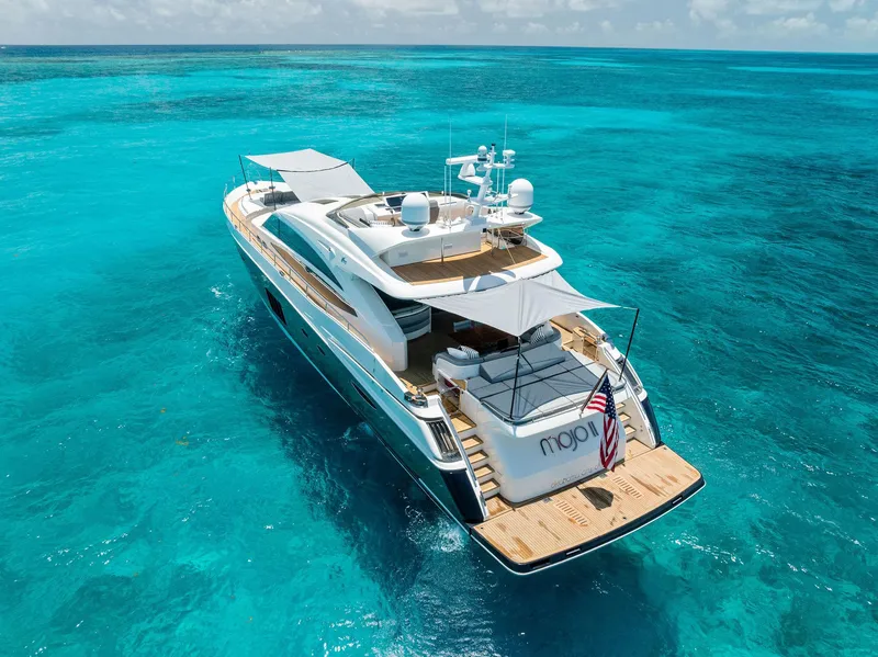 Slide: The Image of Luxurious 2009 Princess Motor Yacht cruising in clear turquoise waters. - 22