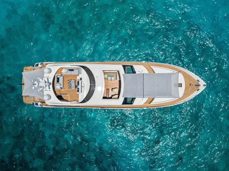 Slide: The Image of Aerial view of 2009 Princess Motor Yacht on clear blue water. - 26