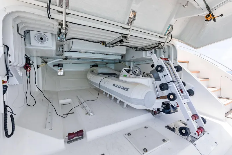 Slide: The Image of Storage compartment of a 2009 Princess Motor Yacht with a Williams tender. - 29