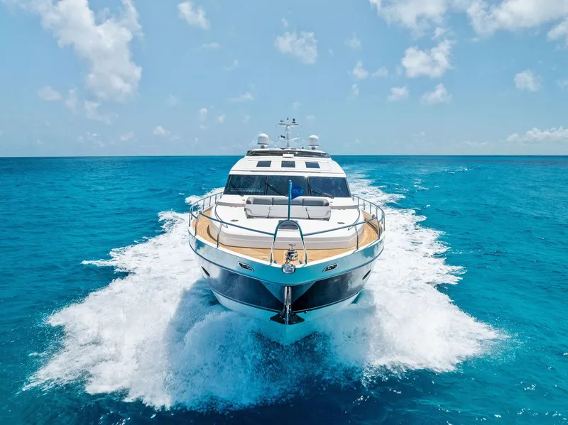 Slide: The Image of Luxurious 2009 Princess Motor Yacht cruising on clear blue ocean waters. - 3
