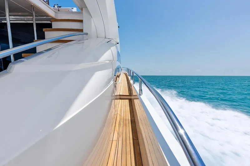 Slide: The Image of 2009 Princess Motor Yacht cruising on clear blue ocean waters. - 32