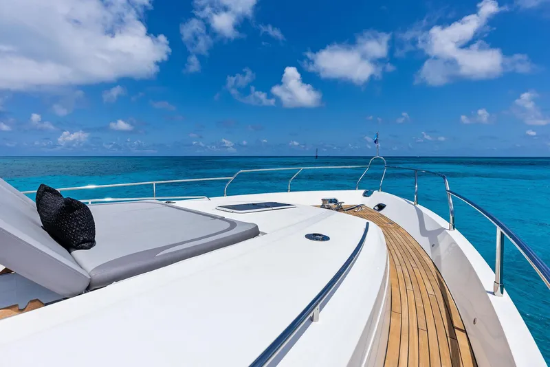Slide: The Image of Luxurious 2009 Princess Motor Yacht deck with ocean view and clear blue skies. - 47