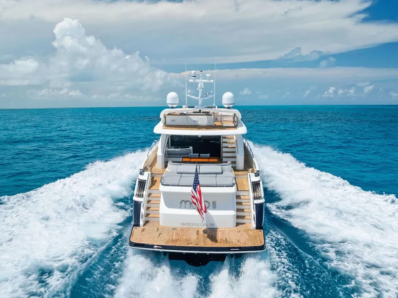 Slide: The Image of 2009 Princess Motor Yacht cruising on open ocean with clear skies. - 8