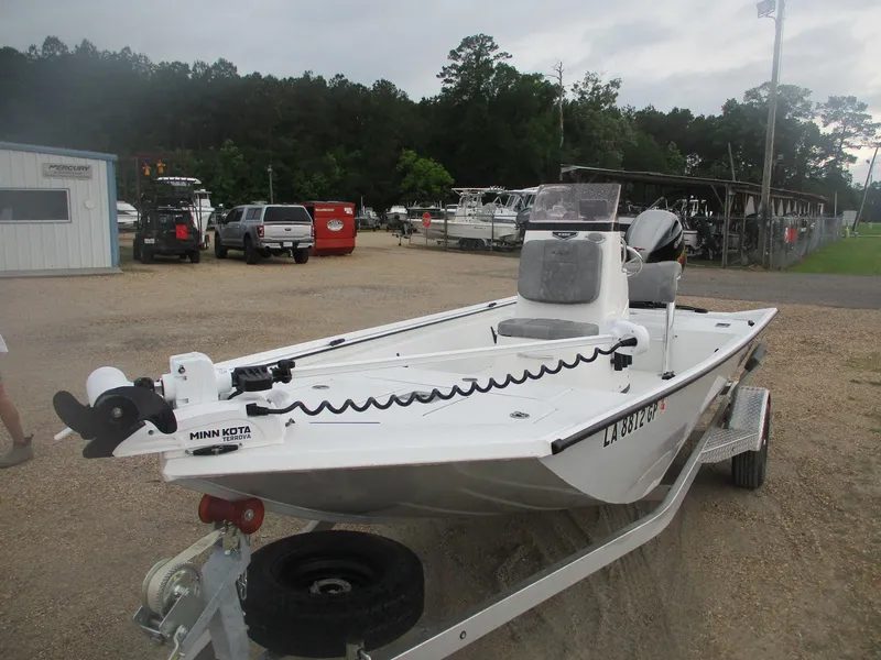 Slide: The Image of 2023 Avid 18 Rogue CC boat on trailer in outdoor setting. - 4