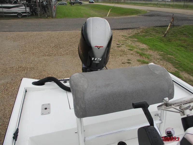 Slide: The Image of 2023 Avid 18 Rogue CC boat with 115 horsepower engine, rear seating view. - 9