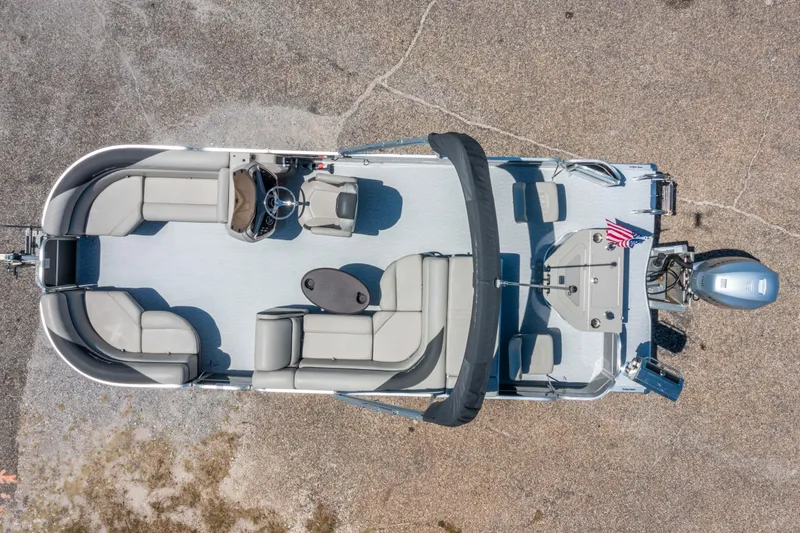 Slide: The Image of Aerial view of 2021 South Bay 224FCR pontoon boat with seating and motor. - 25