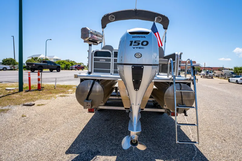 Slide: The Image of 2021 South Bay 224FCR pontoon boat with Honda 150 VTEC engine, rear view. - 3