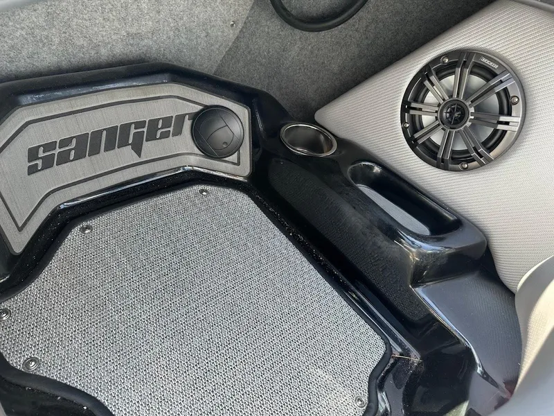 Slide: The Image of Interior of 2025 Sanger V215 SX boat with speaker and branded flooring. - 18
