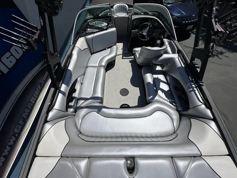 Slide: The Image of 2025 Sanger V215 SX boat interior with sleek gray seating and modern design. - 9