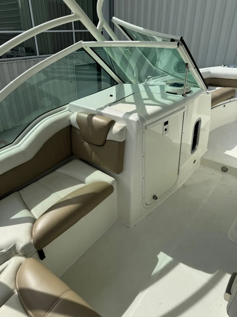 Slide: The Image of 2018 World Cat Glacier Bay Edition 2740 Dual Console interior with seating and console. - 11