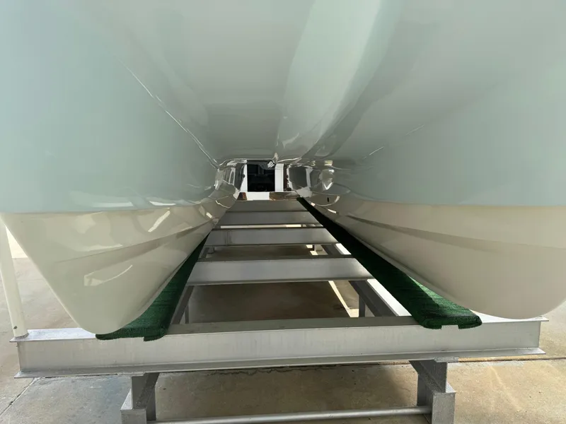Slide: The Image of 2018 World Cat Glacier Bay Edition 2740 Dual Console catamaran hull on trailer. - 3