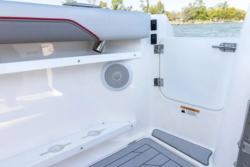 Slide: The Image of 2025 Solara S-250 DC boat interior with speaker and seating detail. - 14