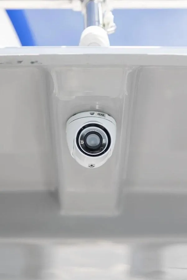 Slide: The Image of 2025 Solara S-250 DC security camera mounted on a white ceiling. - 7