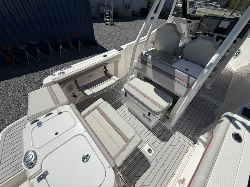 Slide: The Image of 2025 Solara S-250 CW boat interior with white seating and modern design. - 4