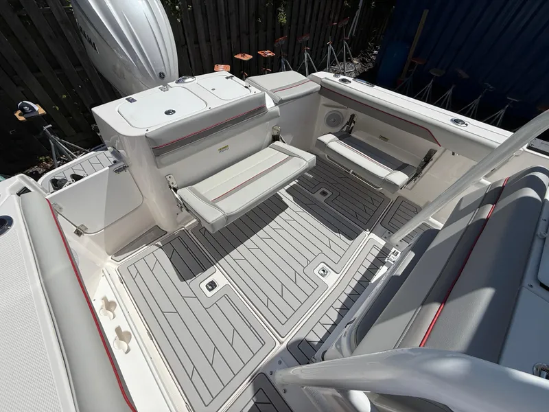 Slide: The Image of 2025 Solara S-250 CW boat interior with foldable seating and sleek design. - 6