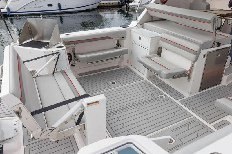 Slide: The Image of 2025 Solara S-310 SC boat interior with spacious seating and modern design. - 12
