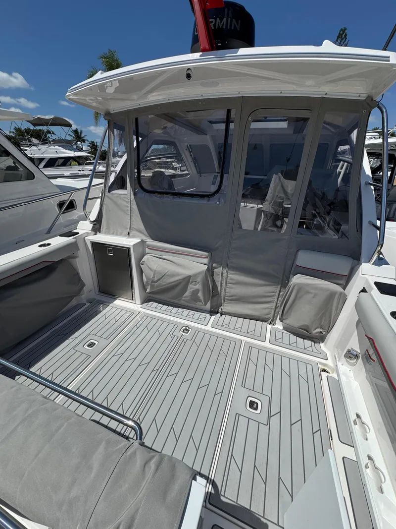Slide: The Image of 2025 Solara S-310 SC boat deck with seating, showcasing modern design and spacious layout. - 17