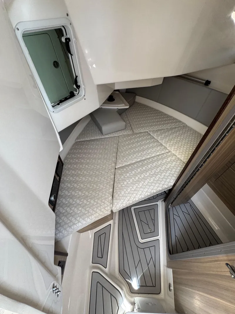 Slide: The Image of 2025 Solara S-310 SC cabin interior with modern design and comfortable bedding. - 25