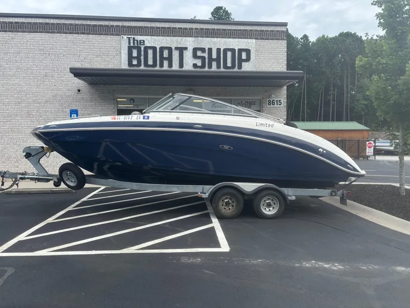 Slide: The Image of 2012 Yamaha Boats 242 Limited on trailer outside The Boat Shop. - 0
