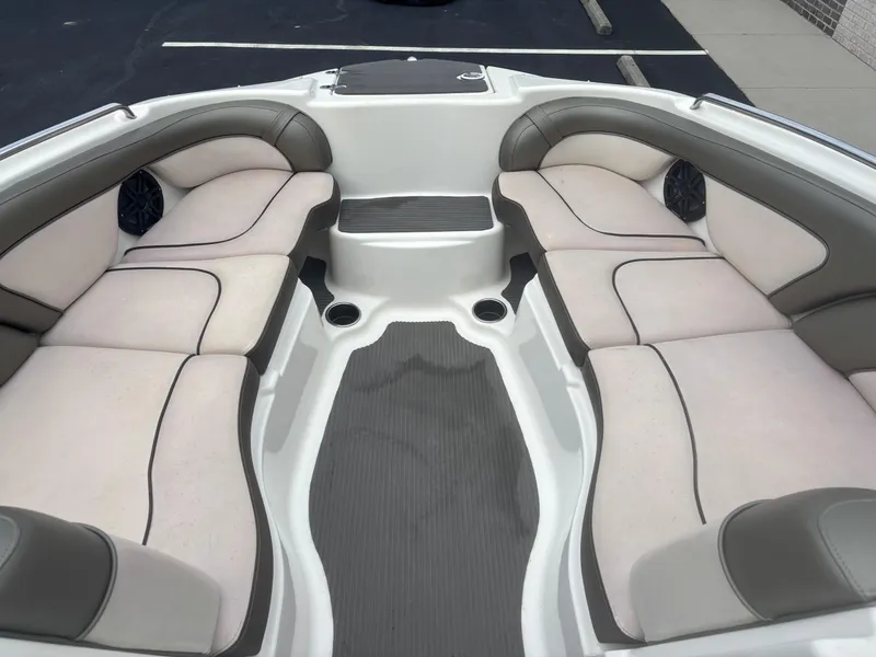 Slide: The Image of 2012 Yamaha Boats 242 Limited interior with spacious seating and sleek design. - 11