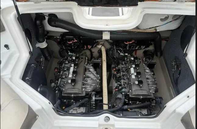 Slide: The Image of 2012 Yamaha Boats 242 Limited engine compartment with dual engines. - 9