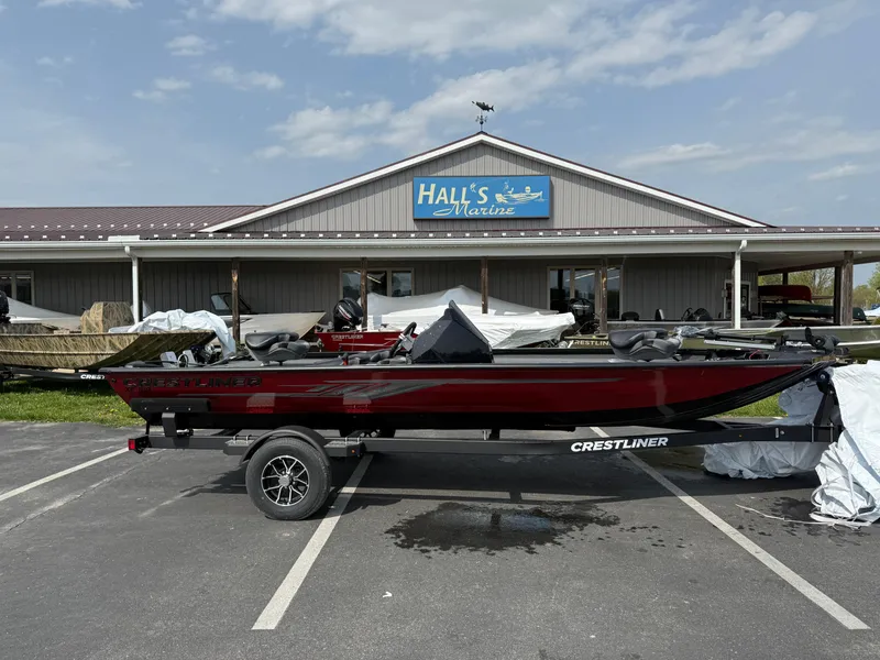 Slide: The Image of 2024 Crestliner XF 189 boat parked outside Hall's Marine dealership. - 0
