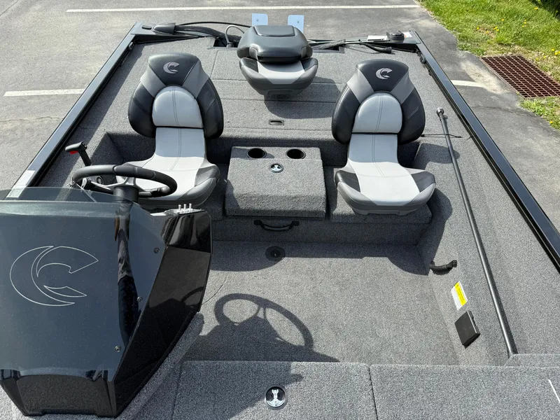 Slide: The Image of 2024 Crestliner XF 189 boat interior with dual seats and steering console. - 7