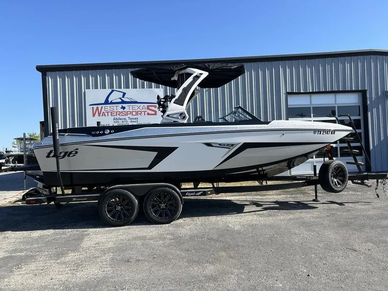 Slide: The Image of 2023 Tigé 22RZX boat on trailer at West Texas Watersports. - 5