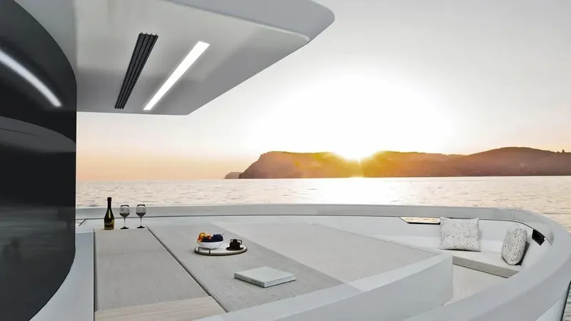 Slide: The Image of Luxurious 2026 Ladenstein L48 MIAMI yacht deck at sunset with elegant seating and ocean view. - 20