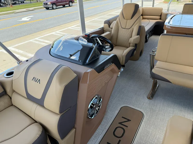Slide: The Image of 2025 Avalon Catalina Entertainer Funship interior with luxurious seating and modern dashboard. - 13