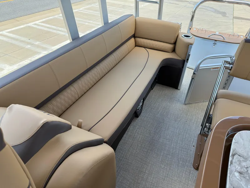 Slide: The Image of 2025 Avalon Catalina Entertainer Funship interior with beige seating and modern design. - 24