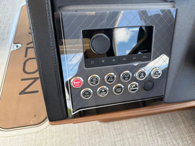Slide: The Image of Control panel of 2025 Avalon Catalina Entertainer Funship with Fusion audio system. - 32