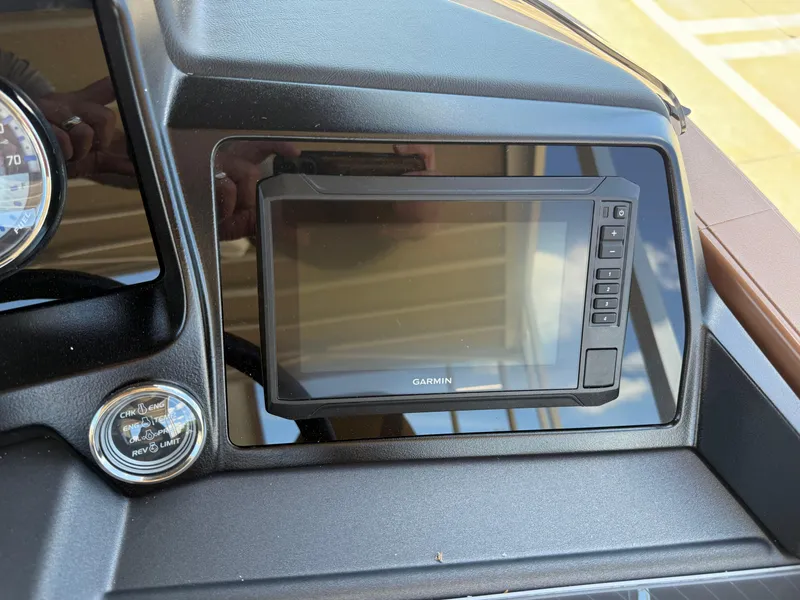 Slide: The Image of Dashboard of 2025 Avalon Catalina Entertainer Funship with Garmin display and controls. - 33