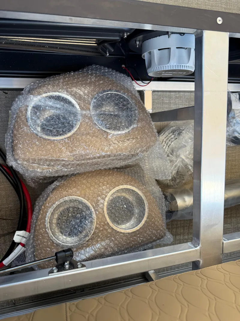 Slide: The Image of Bubble-wrapped speakers in Avalon Catalina Entertainer Funship 2025 boat interior. - 37