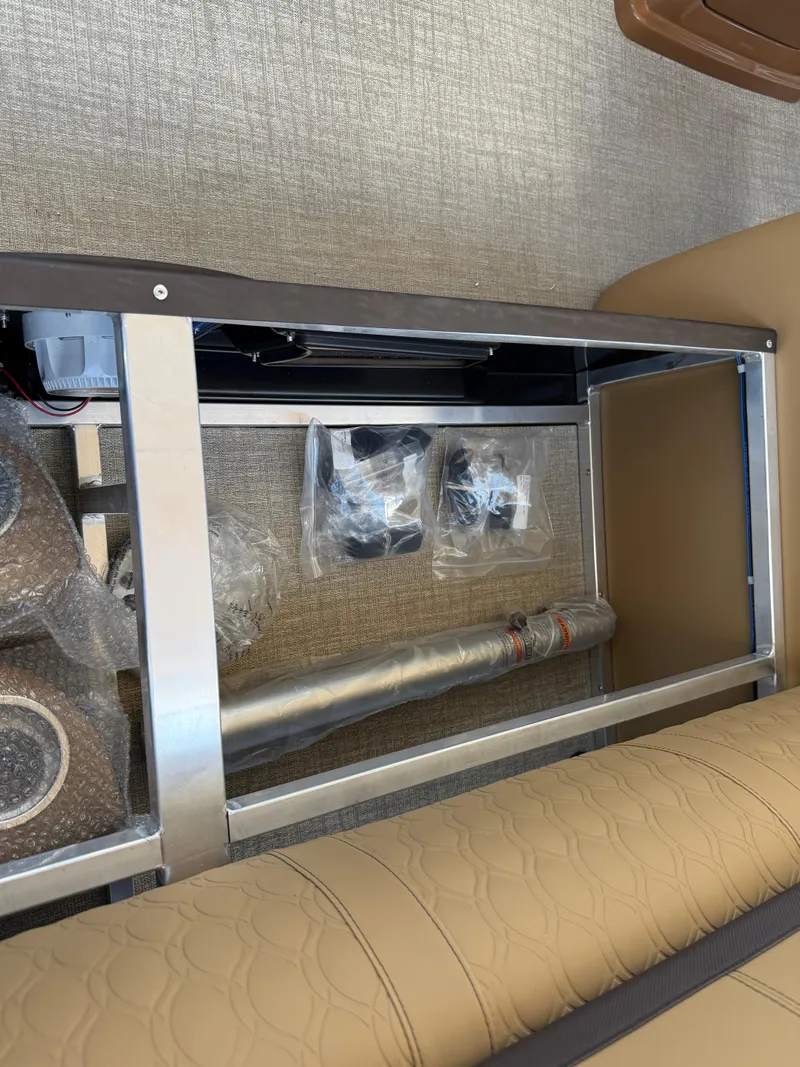 Slide: The Image of Interior view of 2025 Avalon Catalina Entertainer Funship, showcasing seating and storage components. - 38