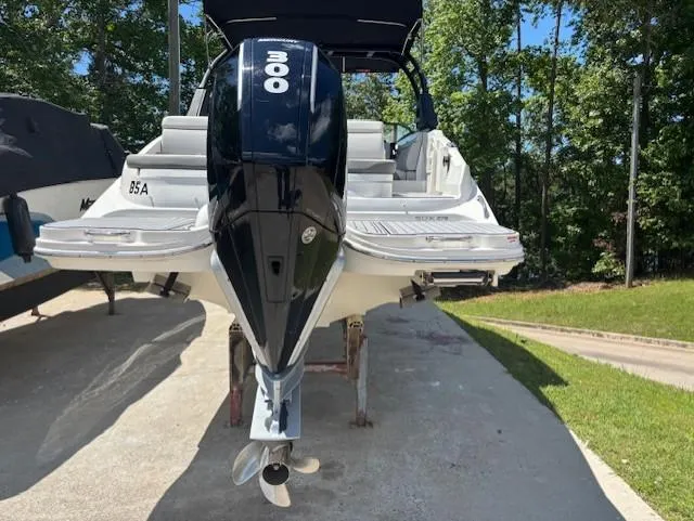Slide: The Image of 2021 Sea Ray SDX 270 Outboard boat with powerful engine, parked outdoors. - 19