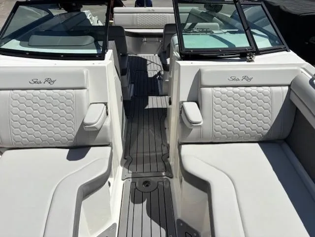 Slide: The Image of 2021 Sea Ray SDX 270 Outboard interior with luxurious seating and sleek design. - 7