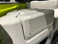 Slide: The Image of 2024 Sea-Doo Switch Cruise 21 interior detail with white seating and green accents. - 12