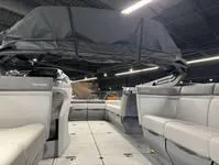 Slide: The Image of 2024 Sea-Doo Switch Cruise 21 interior with spacious seating and canopy. - 19