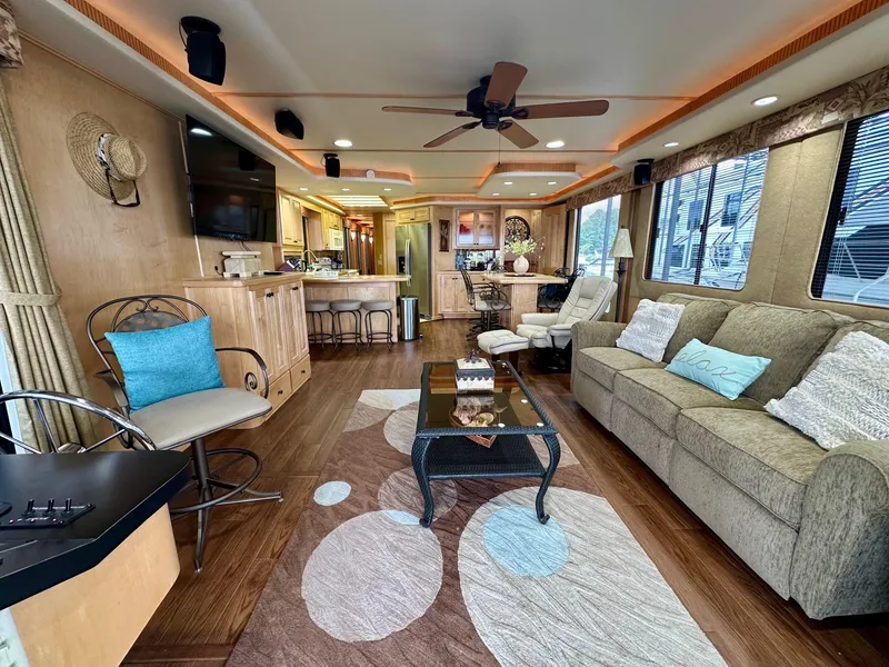 Slide: The Image of Luxurious 2006 Stardust Cruisers 16x78 houseboat interior with modern furnishings and elegant decor. - 2